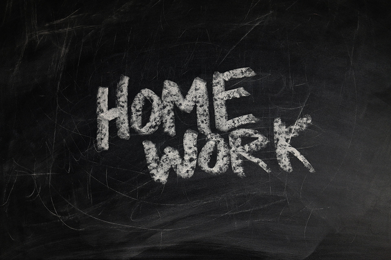 homework sign on the black board